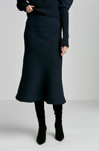 CREPE KNIT PEPLUM SKIRT